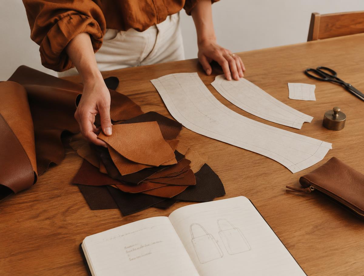 Designer working with leather swatches and patterns